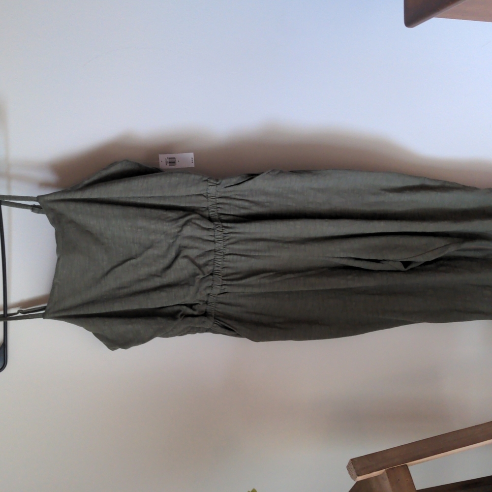 Olive green jumpsuit, never warn